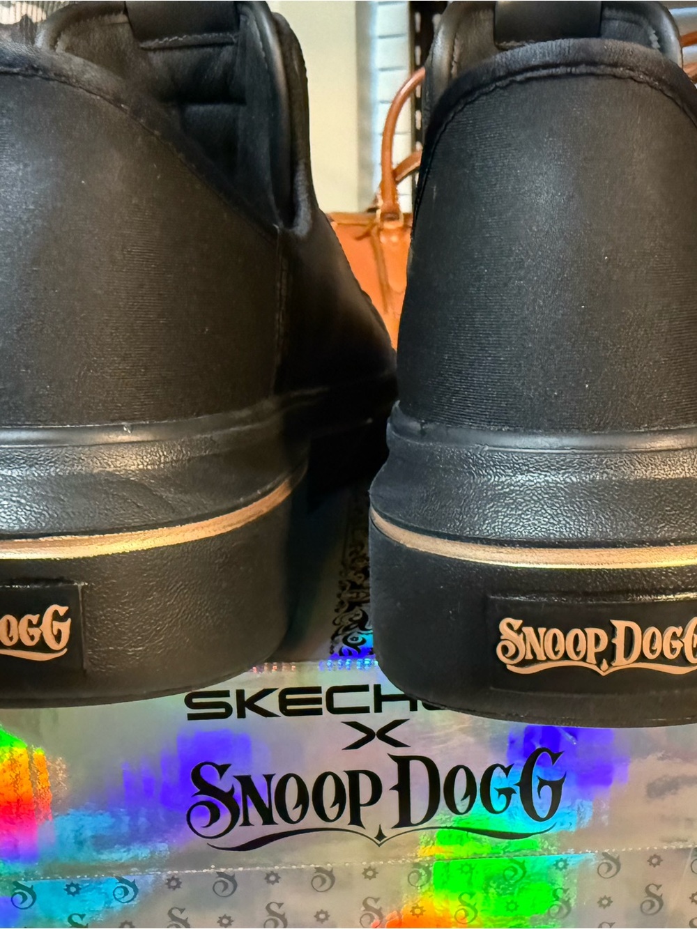 Snoop Dog slip in Skechers Black Leather Low-Top Sneakers with Rose Gold Accents - Picture 6 of 9